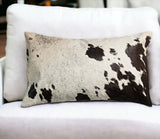 12" X 20" Chocolate And White Abstract Spots Cowhide Throw Pillow