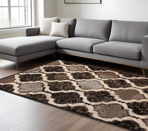 6' X 9' Chocolate Quatrefoil Power Loom Distressed Stain Resistant Area Rug