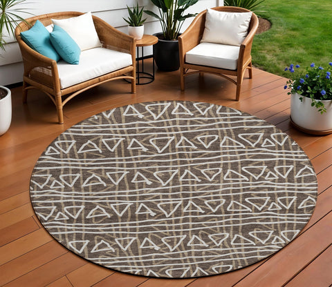 8' Chocolate And Ivory Round Geometric Washable Indoor Outdoor Area Rug